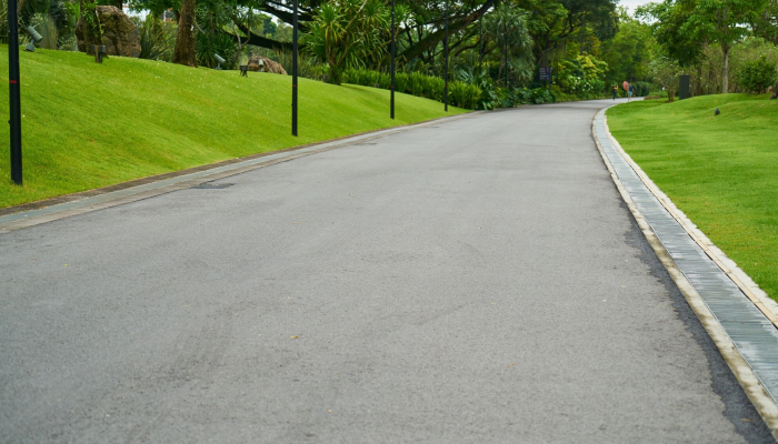 Exposed aggregate concrete driveway in Adelaide completed by SA Landscape & Outdoor Solutions