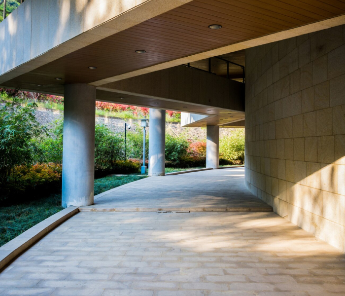 Stencil concrete driveway in Adelaide designed to mimic the look of traditional pavers 