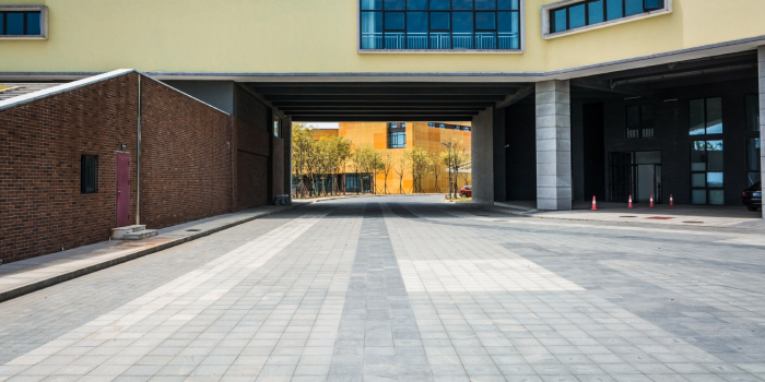Custom coloured concrete driveway in Adelaide with bold kerb appeal and a wide colour range